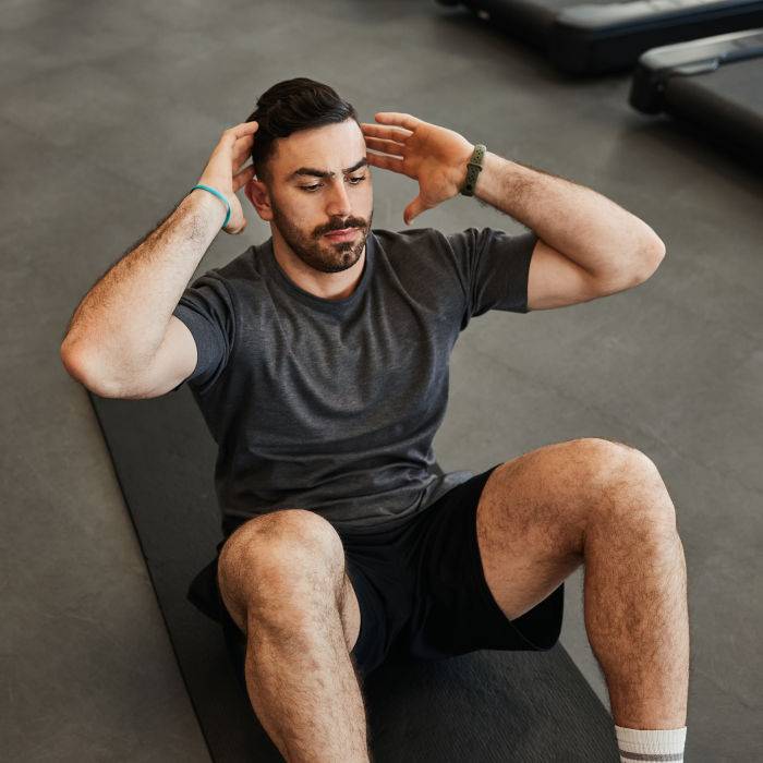 Crunch bicyclette : l’exercice ultime pour sculpter vos abdos